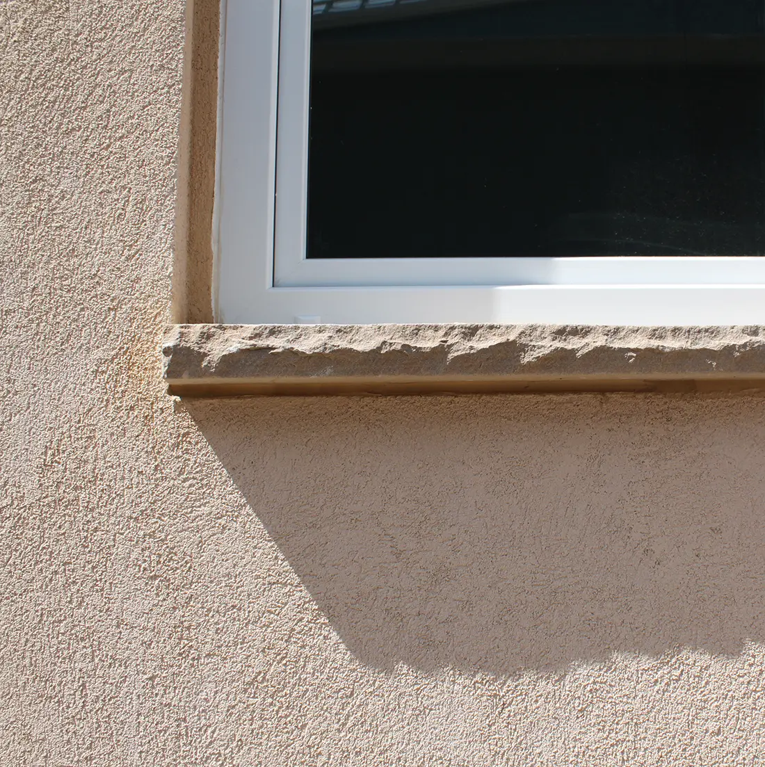 Stone Sill in Plastered Earth Block Wall