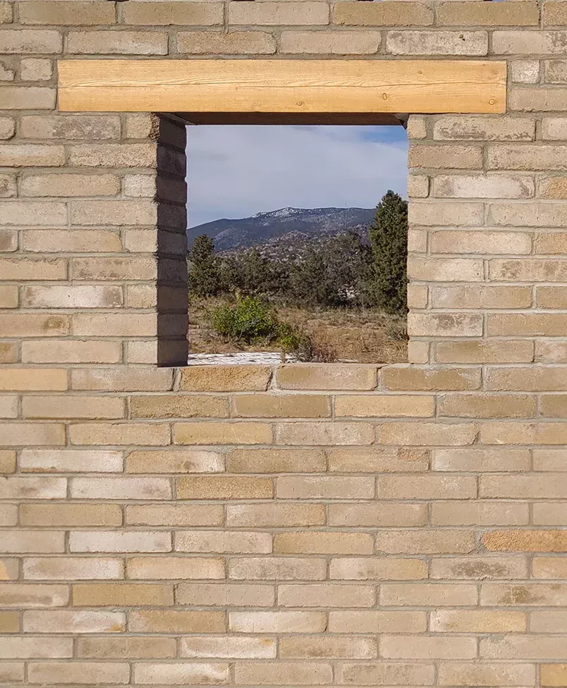 Earth Block Wall Window Opening with Wood Lintel